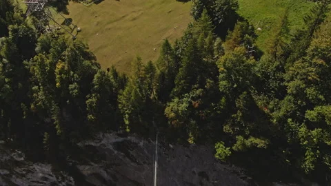 Overhead view of a suspension bridge located in the Swiss Alps Stock Footage 170837483