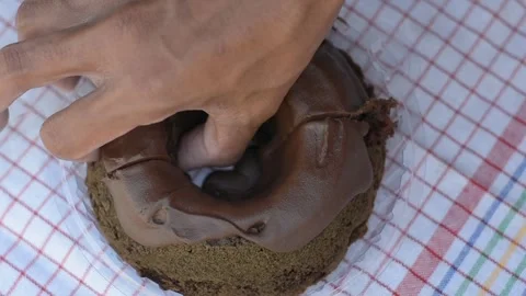 Overhead View Taking a Slice of Chocolate Cake Stock Footage 344880570