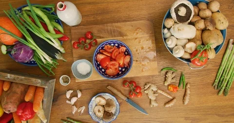Overhead View Of Tomato Salad On Table In Kitchen 4K Stock Footage 92481630