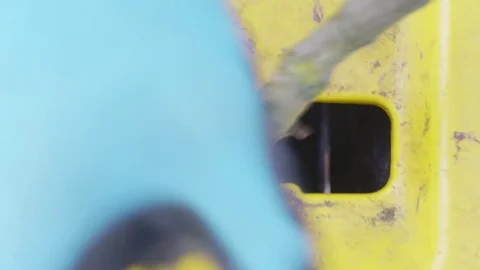 Overhead view of tree branches being inserted in a wood chipper Stock Footage 85067766