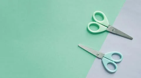 Overhead view two scissors dual colorful background 1 . High quality and Stock Photos