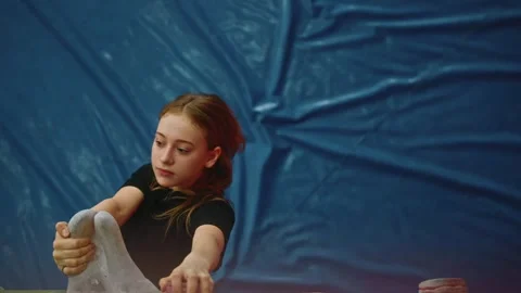 An overhead view from the wall of the climbing wall of a pretty mountaineer girl Stock Footage 276507380