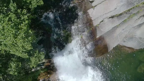 Overhead View Of Water Cascading Down The Waterfall Video stock 311859718