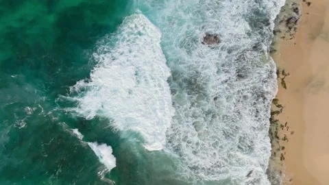An overhead view of waves breaking at Sandy beach park, Oahu, Hawaii. Stock Footage 219897912