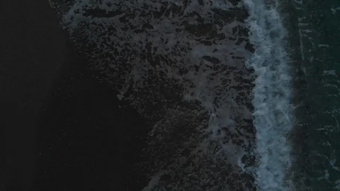 Overhead view of waves crashing into the beach Stock Footage 101854078