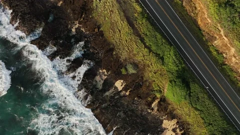 An overhead view of waves crashing on the coast along the East side of Oahu. Stock Footage 233293121