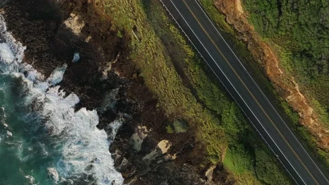 An overhead view of waves crashing on the coast along the East side of Oahu. Stock Footage 233293129