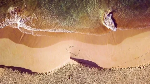 Overhead View Of Waves Crashing On A Sandy Tropical Beach Stock Footage 83959736