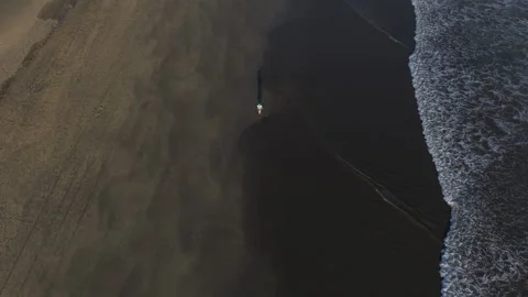 Overhead view of waves on Maspalomas beach rising to reveal the dunes, aerial Stock-Footage 347519363