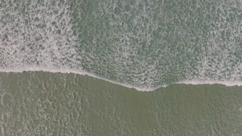 Overhead View Of Waves Splashing Onto Shoreline In Razo Beach. Aerial Topdown Stock Footage 237918225