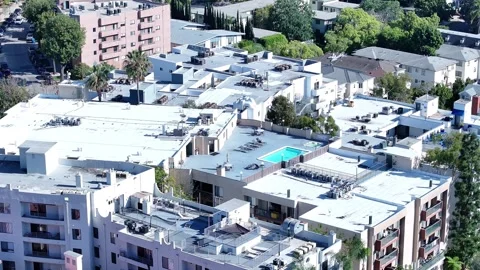Overhead View of Westwood Apartment Rooftops and Rooftop Pool Stock Footage 330515810