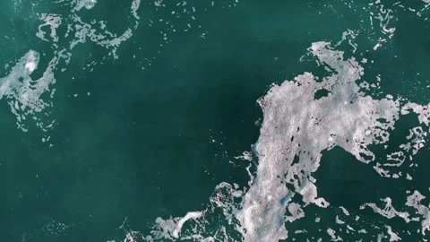 Overhead View Of White Bubbles On The Blue Sea. - aerial shot Stock-Footage 302728638