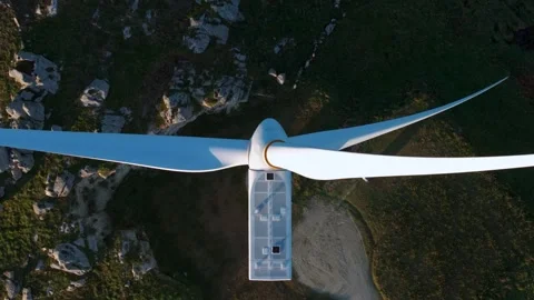 Overhead View Of Wind Turbine With Rotating Blades. - aerial shot Video stock 300355735