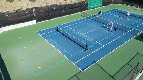 Overhead View of Woman Practicing Pickleball Serves Vidéo 281652573