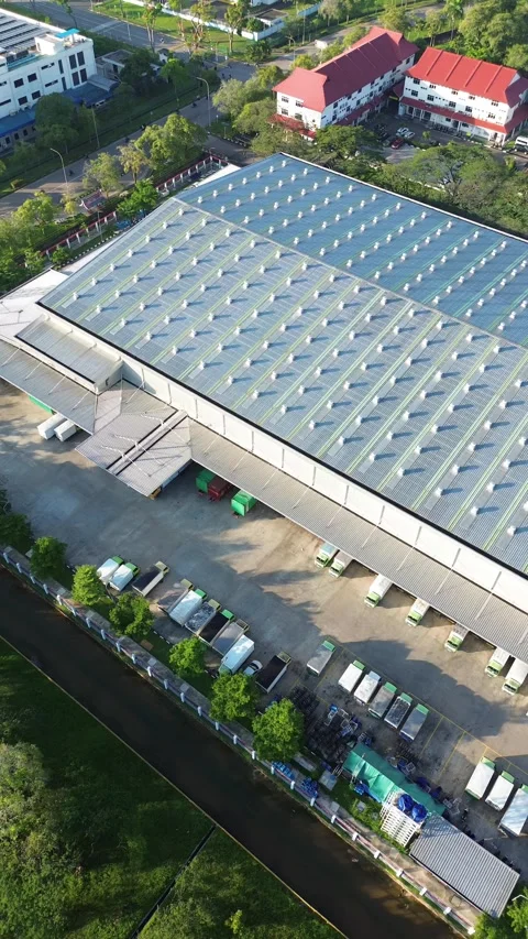 Overhead vista of a vast commercial processing and storage complex, reveali.. Video stock 337280581
