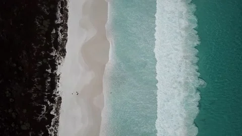 Overhead of Waves Crashing on Shore Stock Footage 164176599