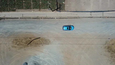Overhead Wide Shot Of A Blue Car Stockbeeldmateriaal 335735568