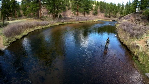 Overhead Wide Time Lapse of Fly Fisherman Casting in the Colorado River Stock Footage 136059546