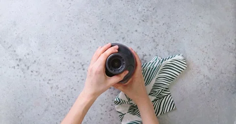 Overhead of Young Female Assembling Blender Stock Footage 128600432