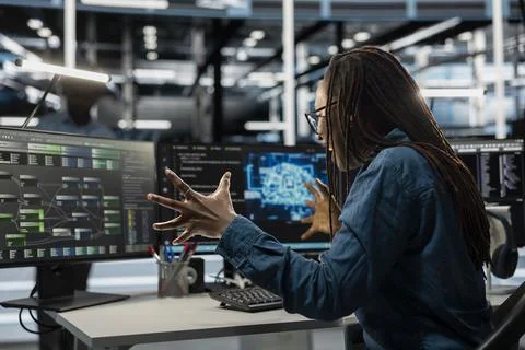 Overjoyed admin satisfied after making data center equipment run AI tools Stock Photos