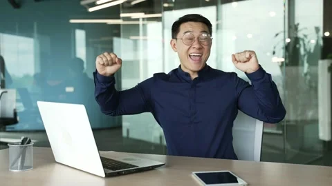 Overjoyed business man IT programmer extremely happy after read email message on Stock-Footage 225756192