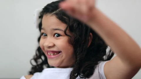 Overjoyed child finding eureka solution to problem, ecstatic little girl cele Stock Footage 142849090