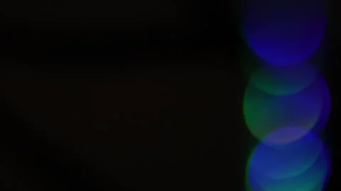 Overlapping bokeh with cool color vertically on the right Vidéo 309488956