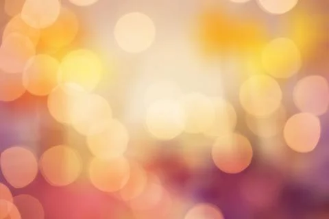 Overlapping circular lights are creating warm bokeh effect in flat design, Foto stock