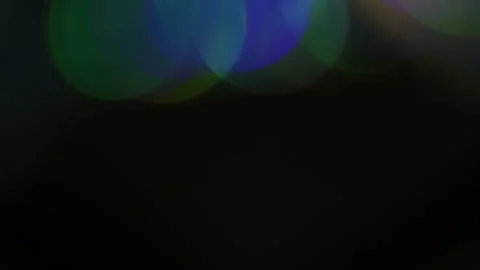 Overlapping colored bokeh upwards Stock-Footage 309491463