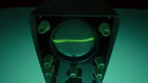 Overlapping Dynamic Waveforms on Oscilloscope Screen under Flickering Light Stock Footage 291934884