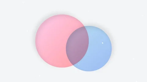 Overlapping pink and blue circles creating a purple intersection on white Video stock 335118333