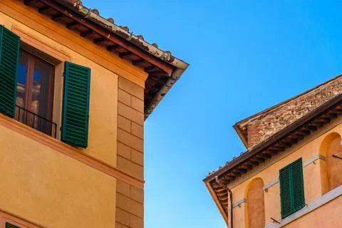Overlapping of two tuscan building Stock Photos