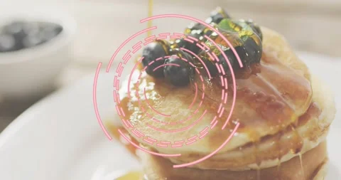 Overlay appearing around pancake stack before syrup pouring over blueberries Stock Footage 317834640