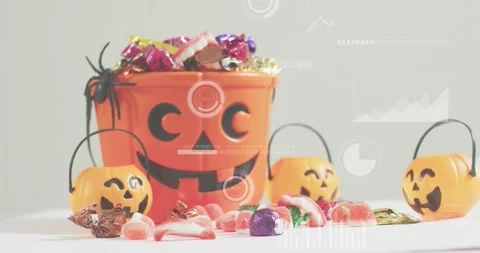 Overlay appearing, data rings filling around pumpkin candy bucket illustrating Stock Footage 317772381