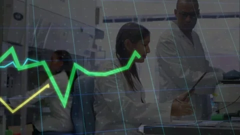 Overlay appearing, seated lab tech checking tablet, noting data while man moving Stock Footage 333830273