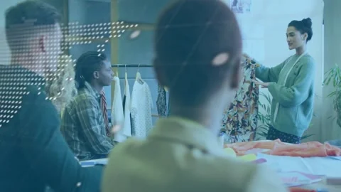 Overlay appearing, stylist lifting pattern top, rotating as team checking Stock Footage 332936433