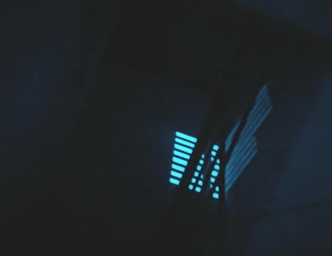 Overlay of sunlight window  reflection on blue wall at night through stairs r Stock Photos