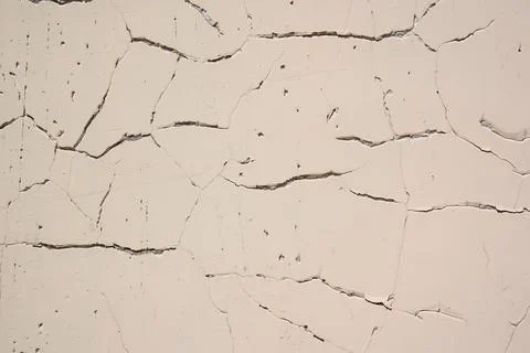 Overlay for your design. Background texture of a white cement wall with a crack Stock Photos