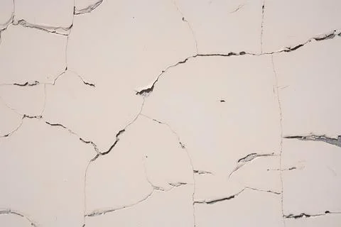 Overlay for your design. Background texture of a white cement wall with a crack Stock Photos