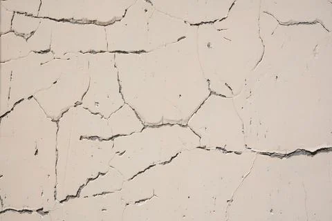 Overlay for your design. Background texture of a white cement wall with a crack Stock Photos