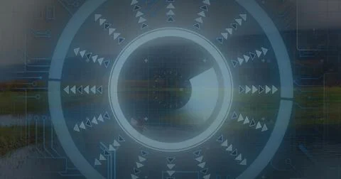 Overlaying circular interface blending into lakeside marsh, with concentric 스톡 사진