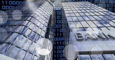 Overlaying digital binary code on modern bank skyscrapers, representing Stock Photos