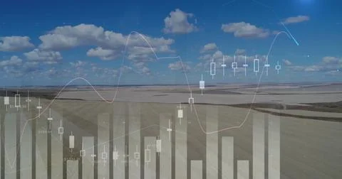 Overlaying financial chart elements over rural field, highlighting candlestick Stock Photos