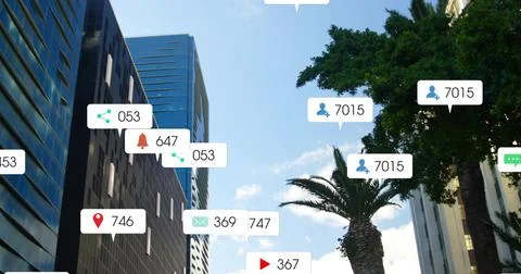 Overlaying white notification bubbles with icons and number badges hovering over Stock Photos
