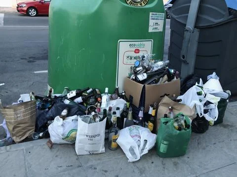 Overloaded trash containers Stock Photos
