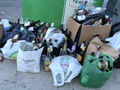 Overloaded trash containers Stock Photos