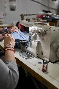Overlock Stitching in Garment Manufacturing Process Stock Photos