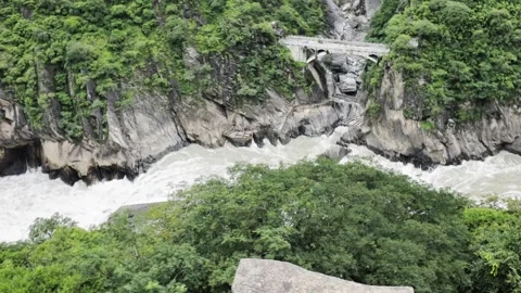 Overlook of Gorge with White Water River and Arch Bridge Stock Footage 340130691