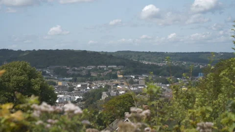An overlook of a town from a hill. Video stock 160466127