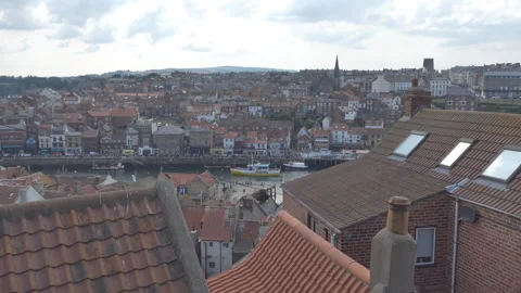 An overlook of a town with a river going through the centre. Britain. Stock Footage 101344908